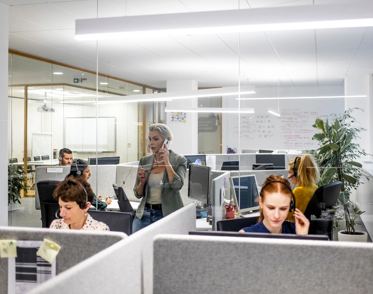 Team collaborating in modern workspace